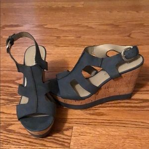 Blue cork platform wedges.
